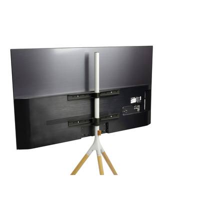 Flachbildfernseher von hinten auf einem Stativ mit Holzbeinen, schwarzes Gehäuse, Kabelanschlüsse sichtbar.