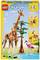 LEGO Creator 3-in-1-Set mit einer baubaren Giraffe, einem Löwen und einem Flamingo vor einem Baum, empfohlen für Kinder ab 9 Jahren.