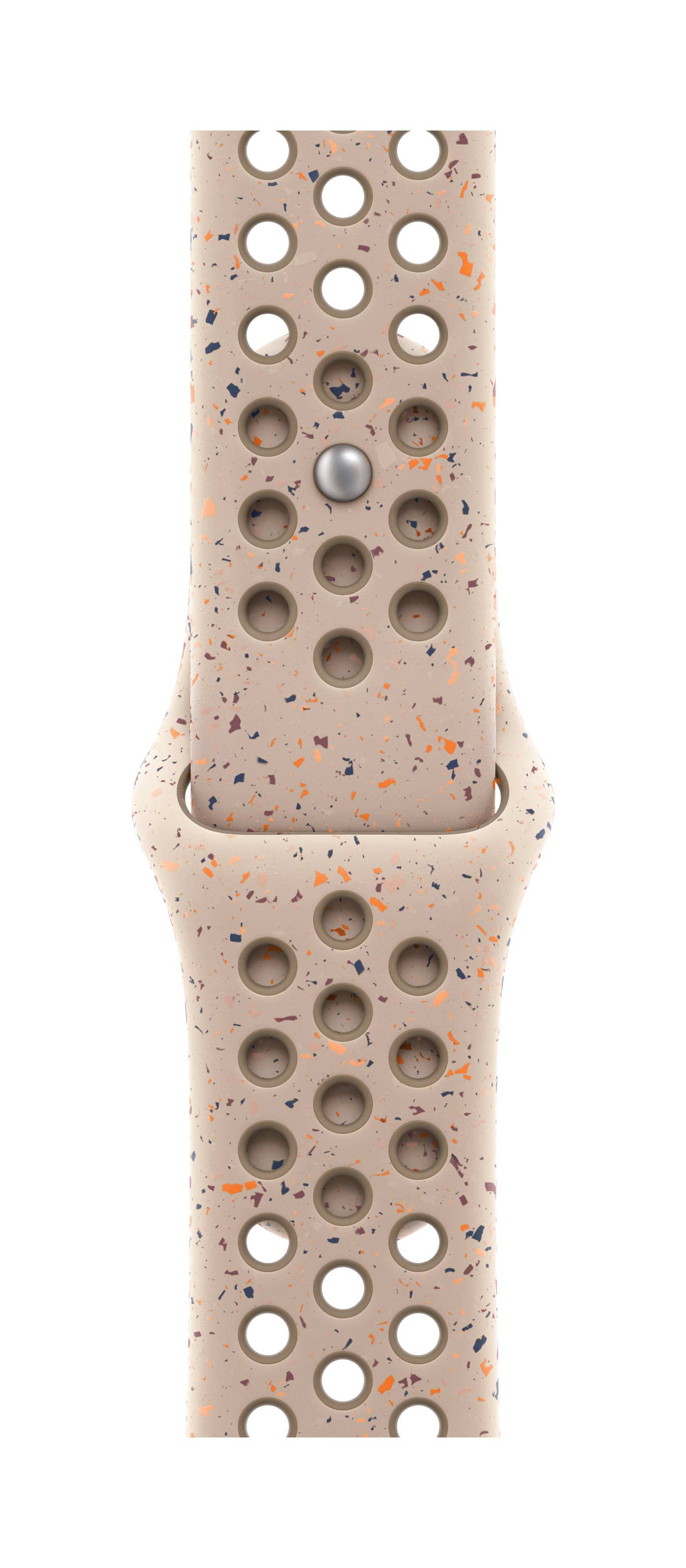 Beige Armband mit vielen Löchern und bunten Spritzern.