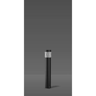 Eine schwarze Säule steht auf einem grauen Hintergrund, oben von einem silbernen Ring umgeben.