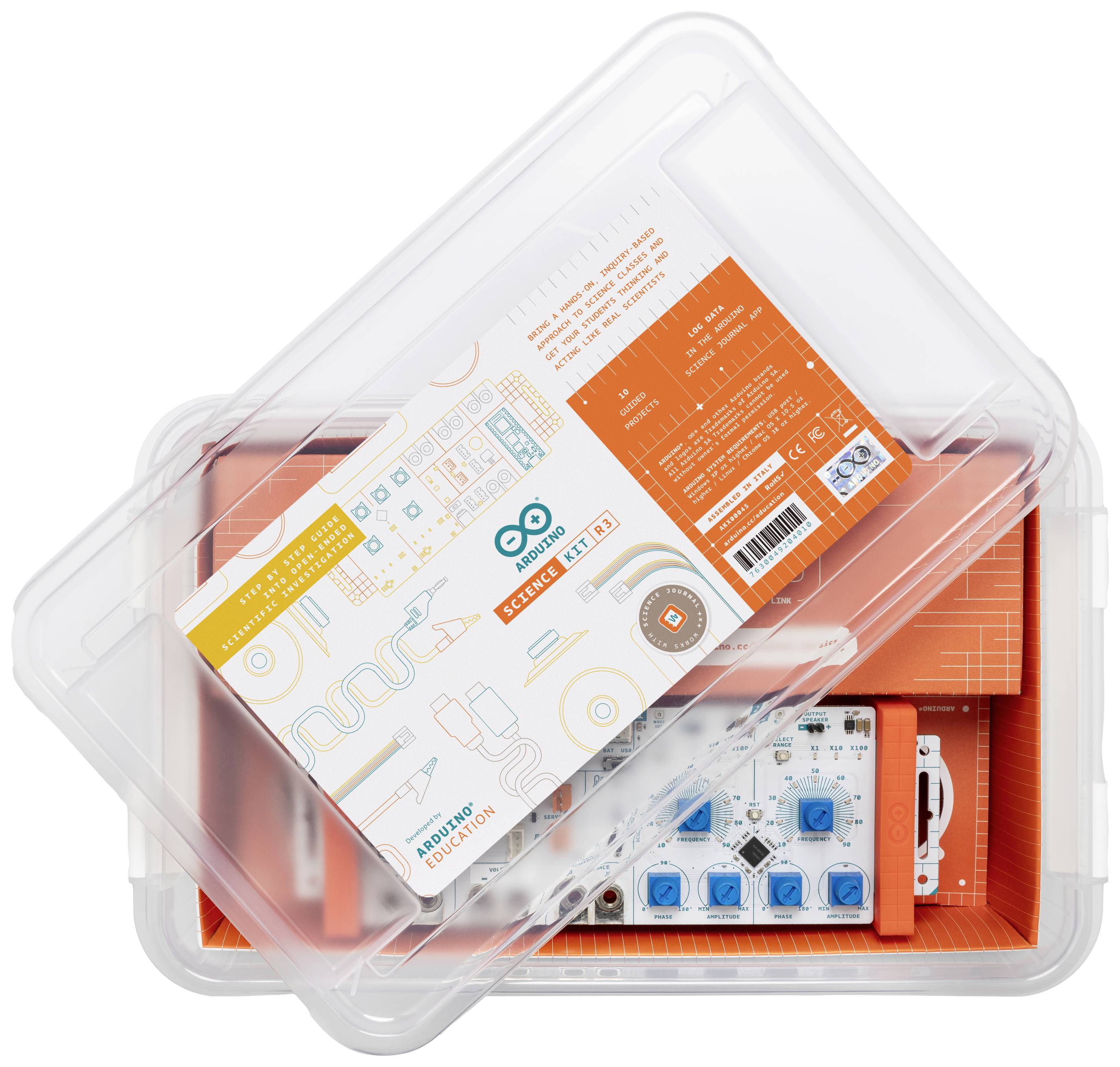 Ein transparentes Plastikgehäuse mit Elektronikkomponenten, darunter rote und blaue Tasten sowie diverse Anschlüsse, zeigt ein Arduino Education Set.