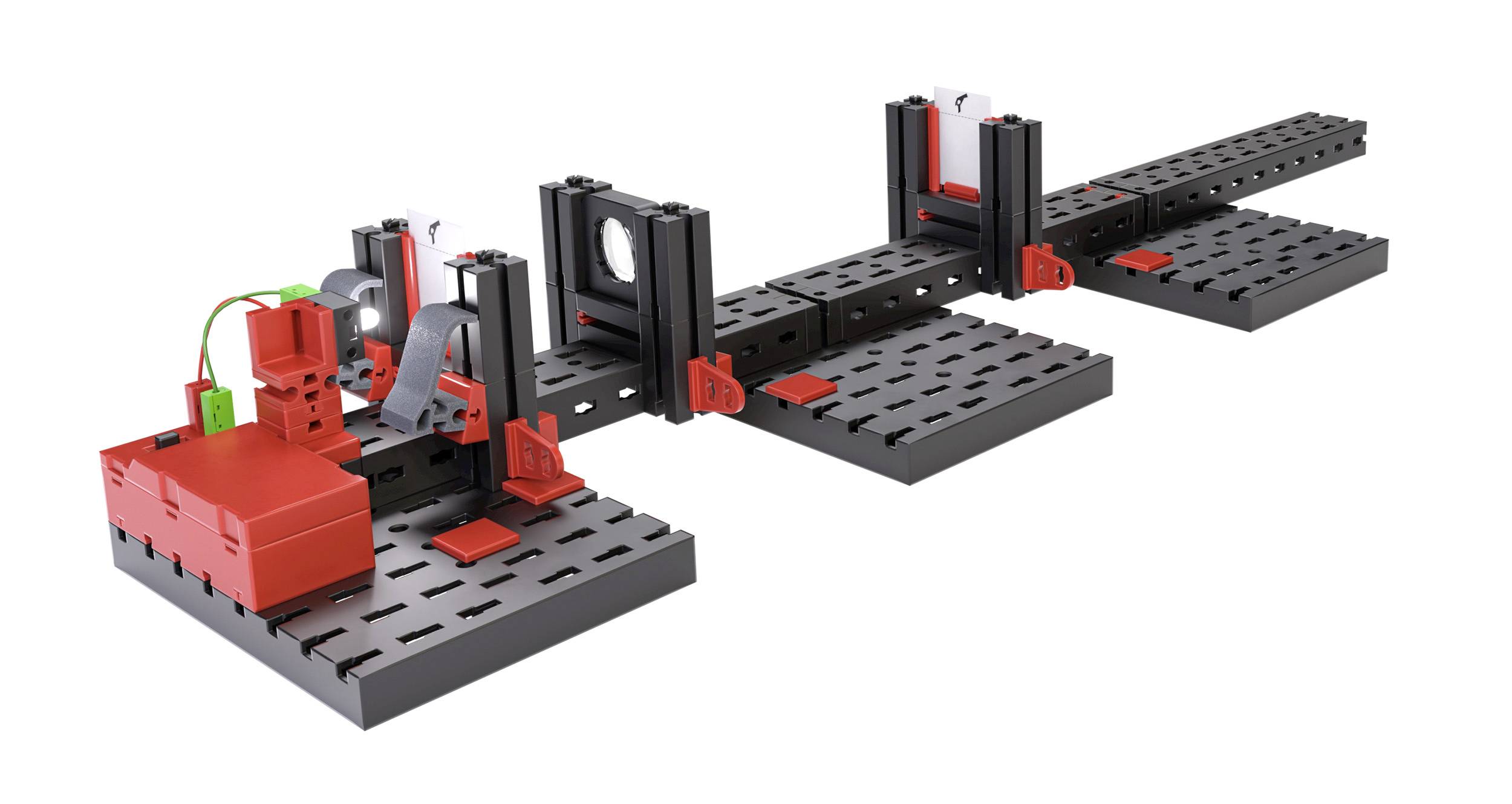 'Optischer Bank-Experimentieraufbau: Schwarze und rote Module zeigen Lichtphänomene, verbunden auf einer perforierten Basisplatte.'