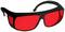 Schwarze Brille mit roten Gläsern und breiten Rahmen. Optisches Hilfsmittel, möglicherweise für Farbkorrektur oder Schutz gedacht.