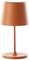 Orangefarbene Tischlampe mit klassischem Design. Zylinderförmiger Schirm und gerader Ständer auf rundem Sockel. Ideal für minimalistisches Interieur.