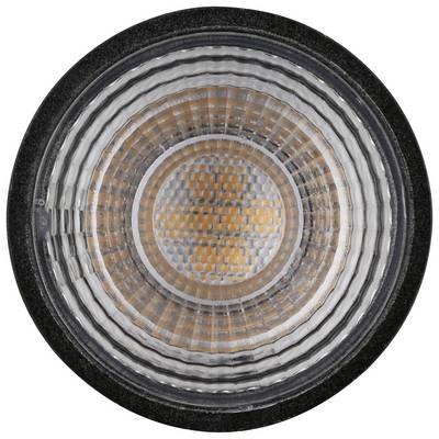 Eine Nahaufnahme eines runden LED-Lichts mit konzentrischen Kreisen in der Linse. Das Licht ist orange-gelb in der Mitte.