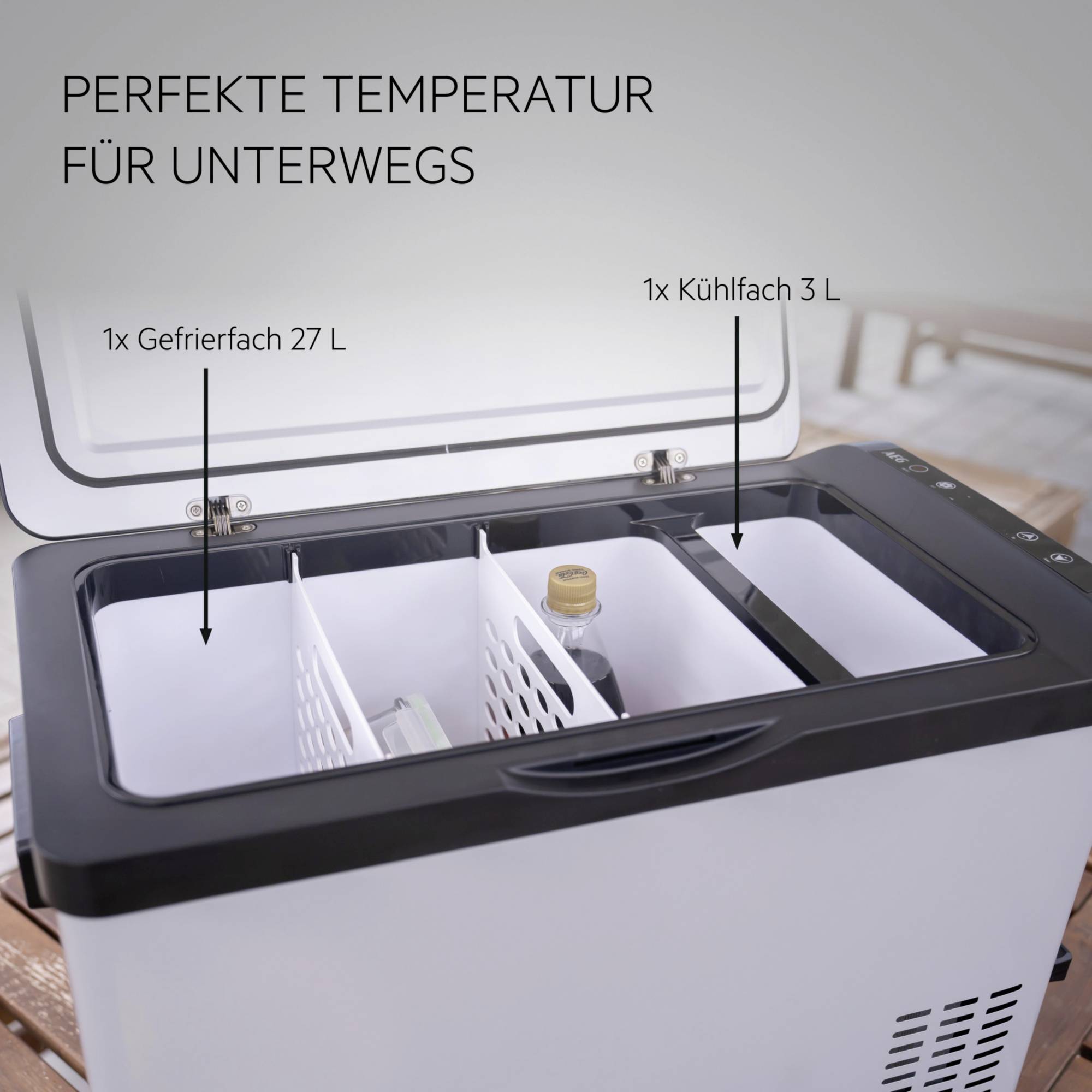 Kühlbox mit zwei Fächern: links ein 27-Liter-Gefrierfach, rechts ein 3-Liter-Kühlfach. Text oben: 'Perfekte Temperatur für unterwegs'.