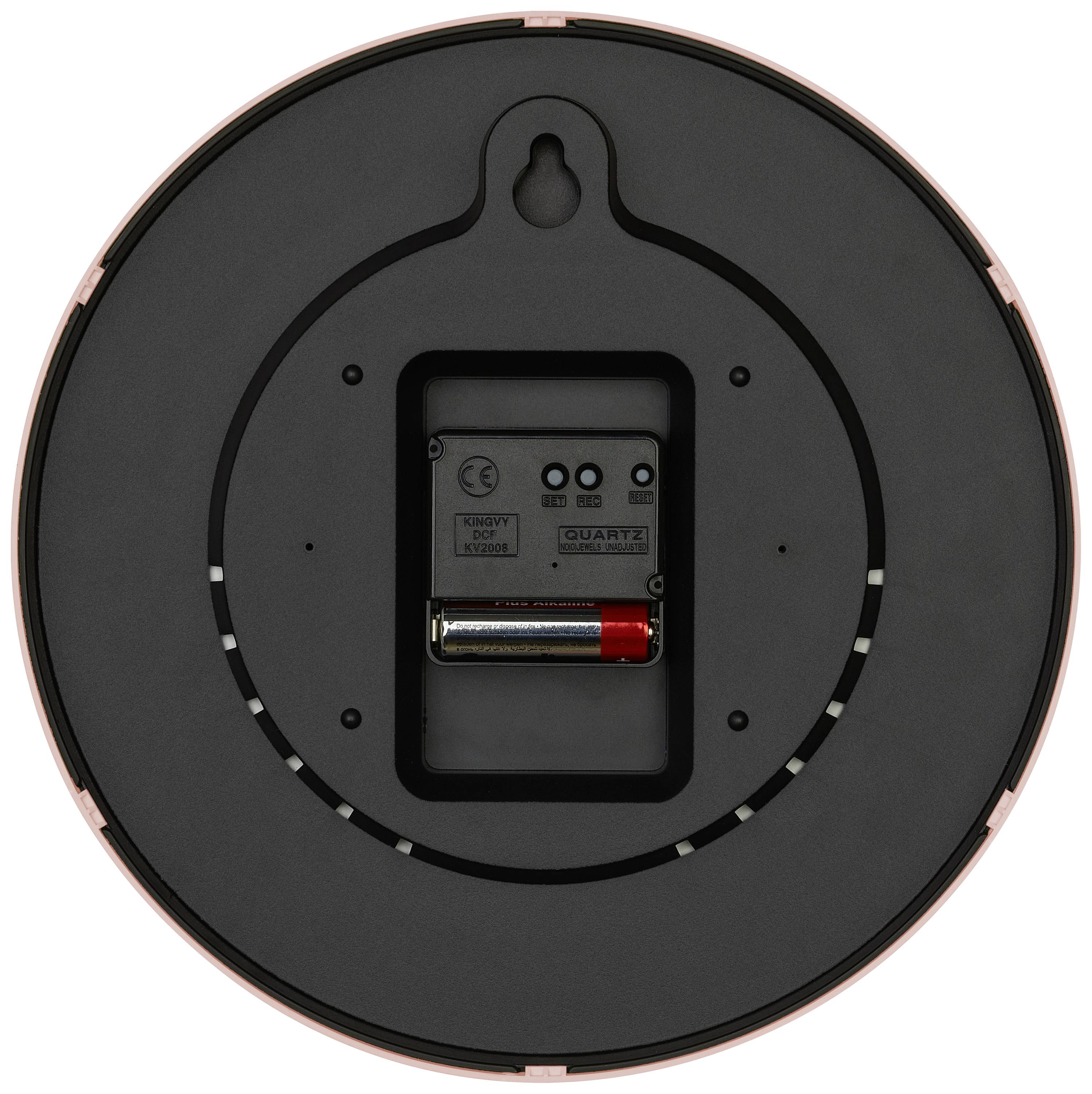 Rückseite einer Wanduhr, Batterie und Quarzwerk sichtbar.