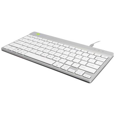 Eine flache, silberne Computer-Tastatur mit weißen Tasten und kabelgebundener Verbindung, schräg von oben fotografiert.