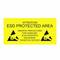 Gelbes Schild mit der Aufschrift 'Attention ESD Protected Area. Observe precautions for handling electrostatic discharge sensitive devices.'