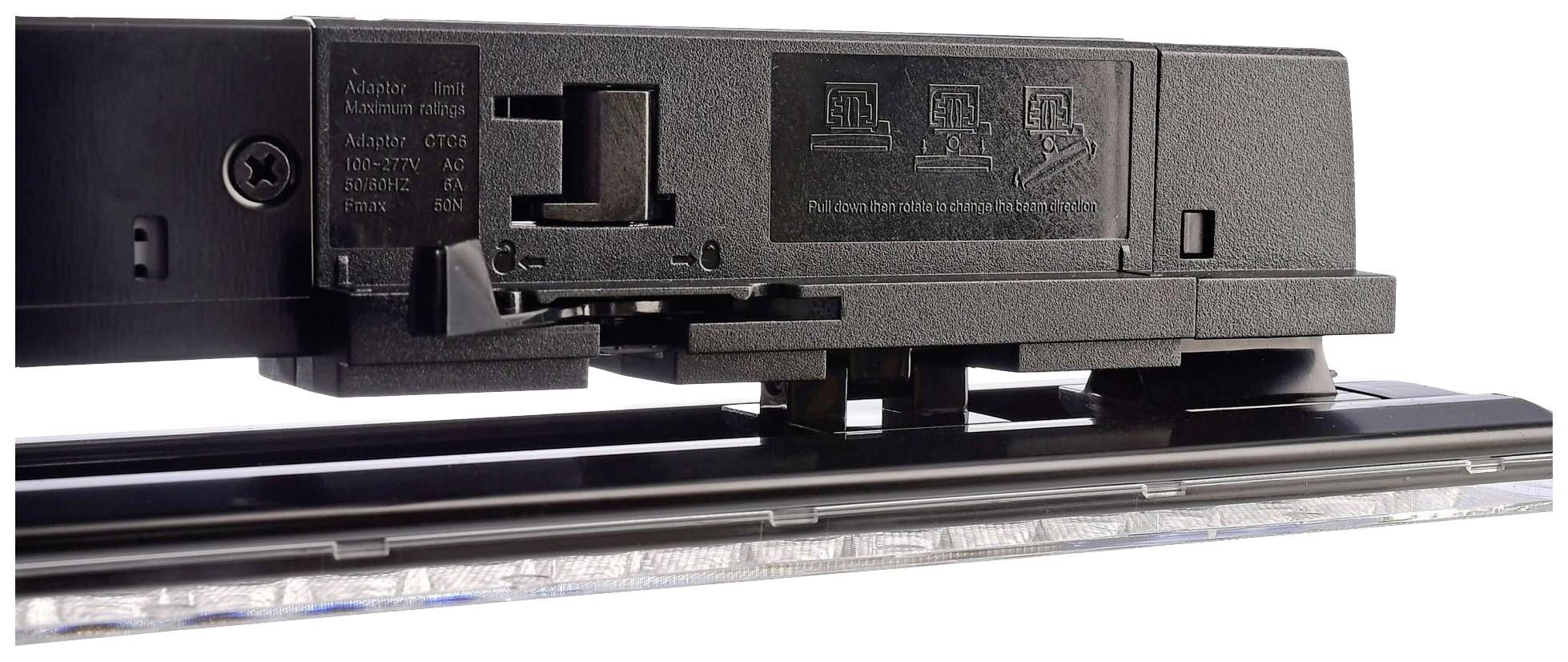 Nahaufnahme eines schwarzen, elektrischen Geräts mit Schalter und Anschlüssen. Oben sind Anweisungen zur korrekten Verwendung abgebildet.