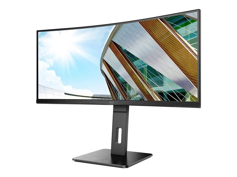 Gebogener Computerbildschirm zeigt modernes Gebäude mit Glasfassaden bei Sonnenschein.