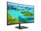 Ein gebogener Computermonitor zeigt eine tropische Inselgruppe mit türkisfarbenem Wasser und grünen Inseln unter einem blauen Himmel.