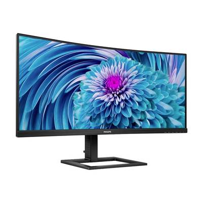 Ein geschwungener Monitor mit lebendigem, blumenartigem Hintergrundbild in Blau- und Lilatönen; Markenname ist sichtbar.