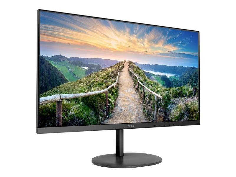 Ein Monitor zeigt ein Landschaftsbild mit einem Weg, der durch grüne Hügel führt, unter einem Himmel mit bunten Wolken.