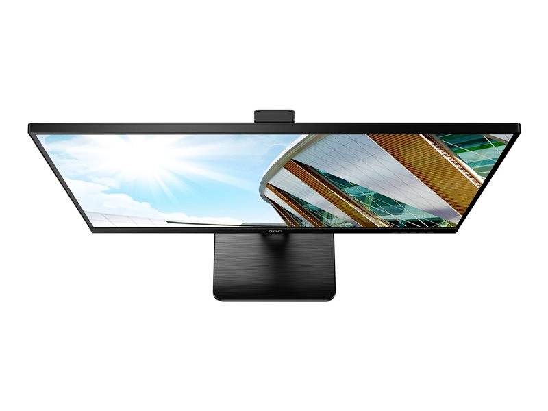Ein Monitor von oben gesehen, zeigt ein klares Bild mit blauen Himmel und moderner Architektur auf dem Bildschirm.