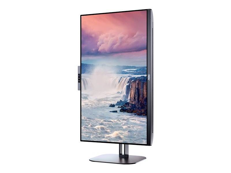 Ein Monitor im Hochformat zeigt ein Bild eines Wasserfalls unter einem rosa Himmel.