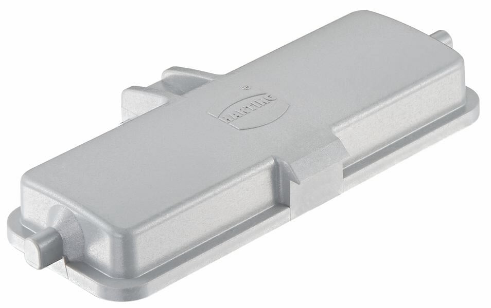 Metallische Gehäuseabdeckung in rechteckiger Form, seitlich zwei Befestigungselemente. Oberfläche glatt, Name 'Harting' eingraviert.