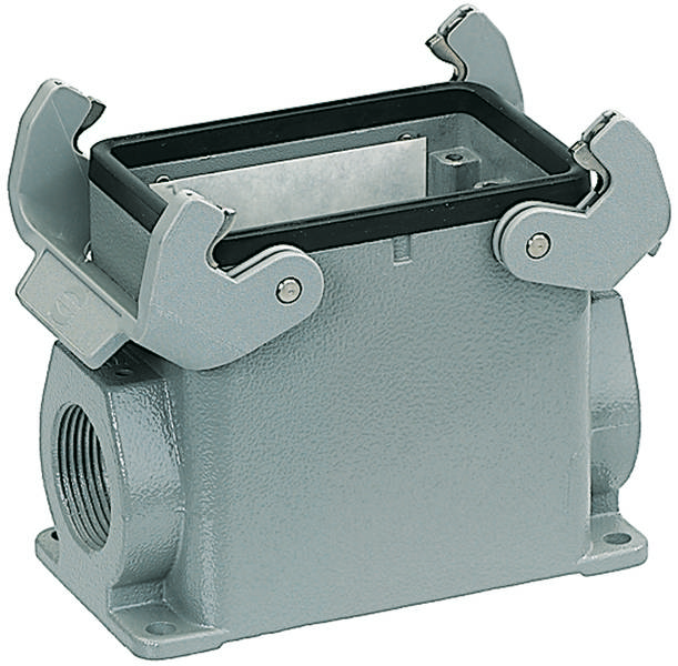 Ein graues rechteckiges Gehäuse aus Metall mit Klappdeckeln und seitlicher Gewindeöffnung. Hauptsächlich verwendet für elektrische Verbindungen.