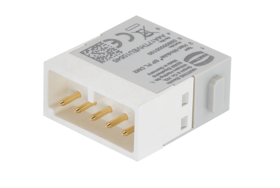Rechteckiger Kunststoffstecker mit vier goldenen Kontakten und Hinweisen zur elektrischen Spezifikation und Sicherheitssymbolen auf der Oberseite.