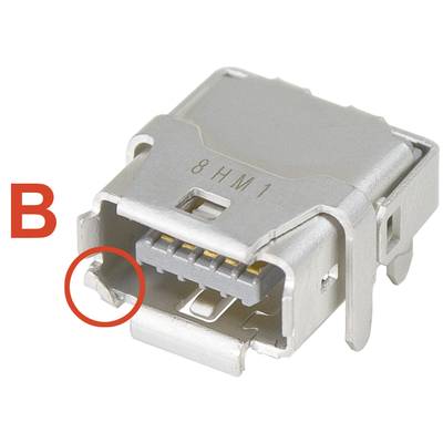 'Mikro-USB-Buchse, Typ B, mit fünf Pins sichtbar. Ein roter Kreis hebt ein Strukturdetail an der linken unteren Ecke hervor.'