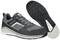 'Dunkelgrauer Sneaker mit schwarzer Sohle und hellem Streifen, Marke "albatros", gepolsterter Kragen und Schnürsenkel, seitliche Ansicht.'