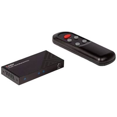 Schwarzer HDMI-Schalter mit Fernbedienung. Der Schalter hat drei Eingänge und einen Knopf; die Fernbedienung vier runde Tasten.