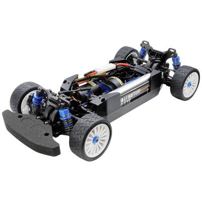 Ferngesteuertes Auto-Chassis mit sichtbaren Federn, Motor und Batterie. Sportliche, robuste Bauweise mit blauen und weißen Elementen.