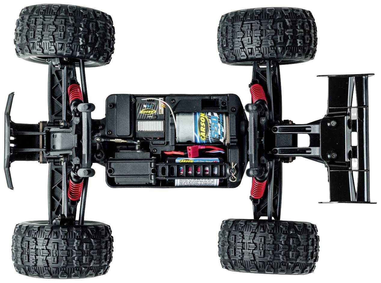 Fahrgestell eines ferngesteuerten Autos mit sichtbarem Motor, elektronischen Komponenten und Reifen, Ansicht von unten.