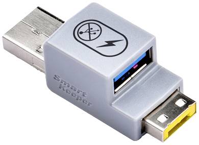 Ein USB-Schutzadapter mit einem Symbol für Stromsperre auf der Oberseite. Er verhindert unbefugten Zugriff auf USB-Anschlüsse.