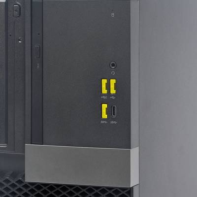 Ein Computergehäuse mit mehreren Anschlüssen, darunter USB- und Audioanschlüsse mit gelben Markierungen, an der rechten Vorderseite.