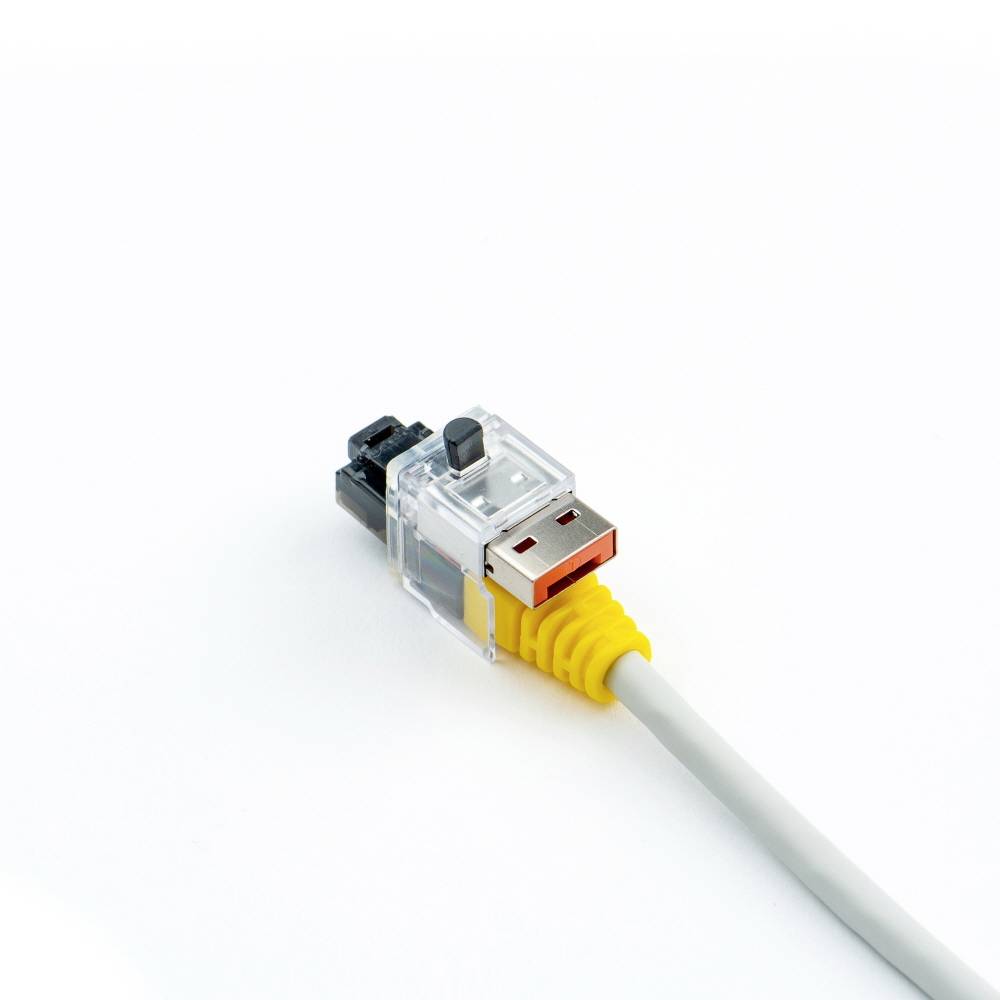 Ein graues Kabel mit einem transparenten Kunststoffstecker und einem USB-Anschluss.