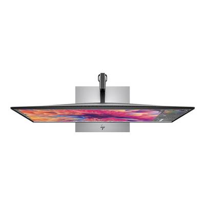 Ein ultraflacher Computermonitor von oben gesehen, auf dem leuchtende Farben angezeigt werden. Markenzeichen sichtbar auf der Rückseite.