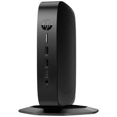 Ein schwarzer, schmaler Desktop-Computer mit mehreren USB-Anschlüssen, aufrecht stehend auf einem Standfuß.