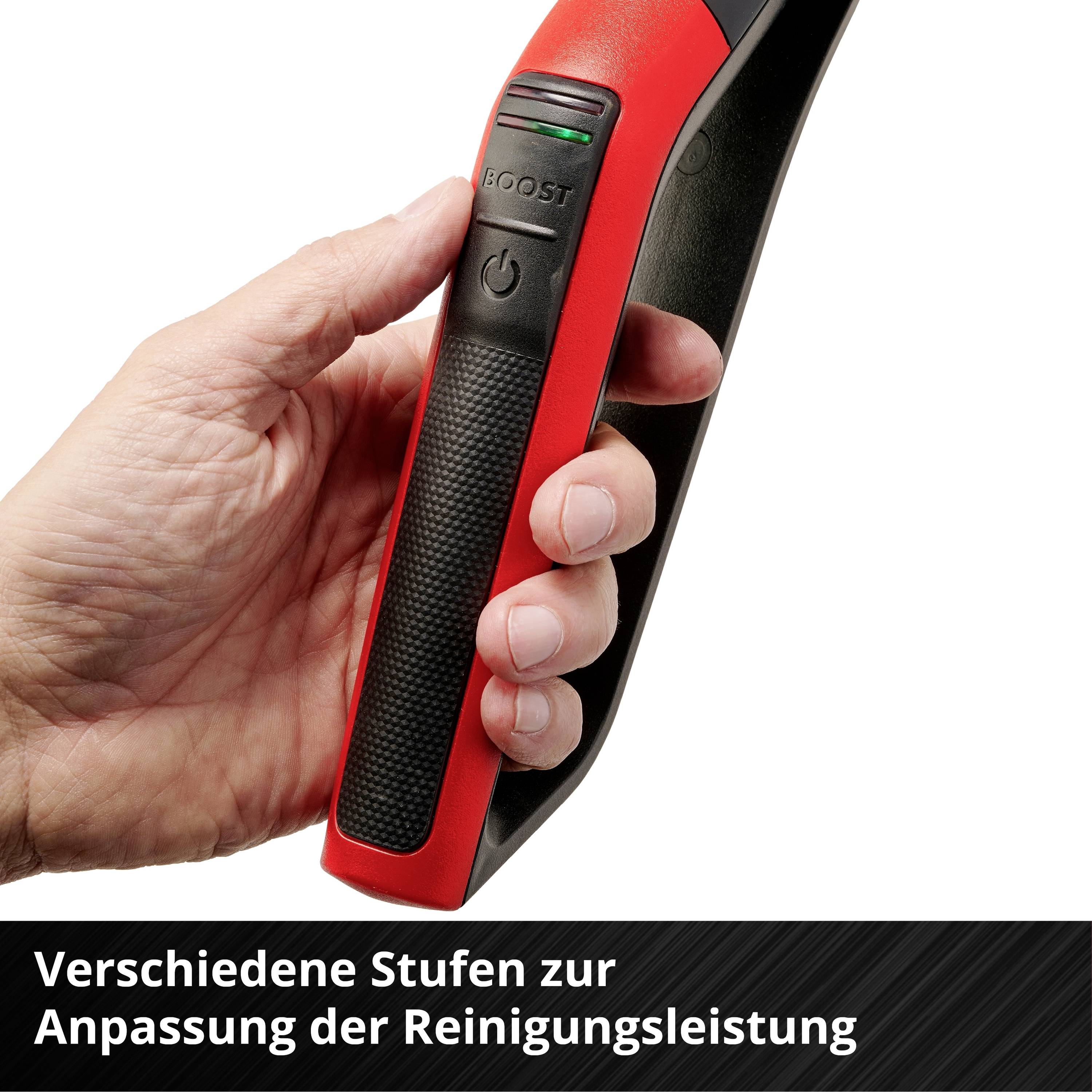 Eine Hand hält ein rotes, ergonomisches Gerät mit schwarzem Griff und grünem 'Boost'-Knopf. Text unten: 'Verschiedene Stufen zur Anpassung der Reinigungsleistung'.