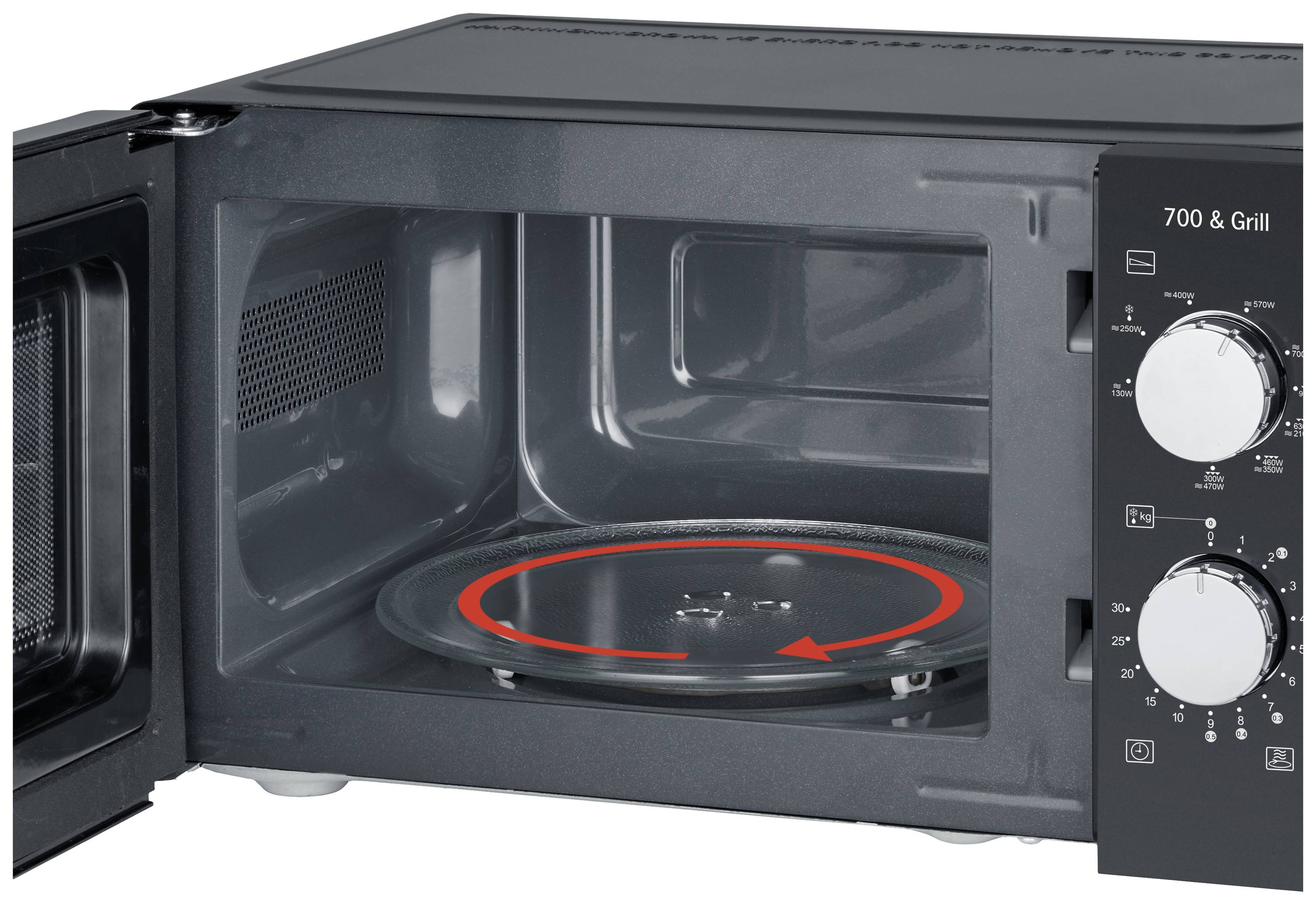 'Mikrowelle mit geöffneter Tür, Sicht auf den Drehteller und Bedienelemente an der Seite.'