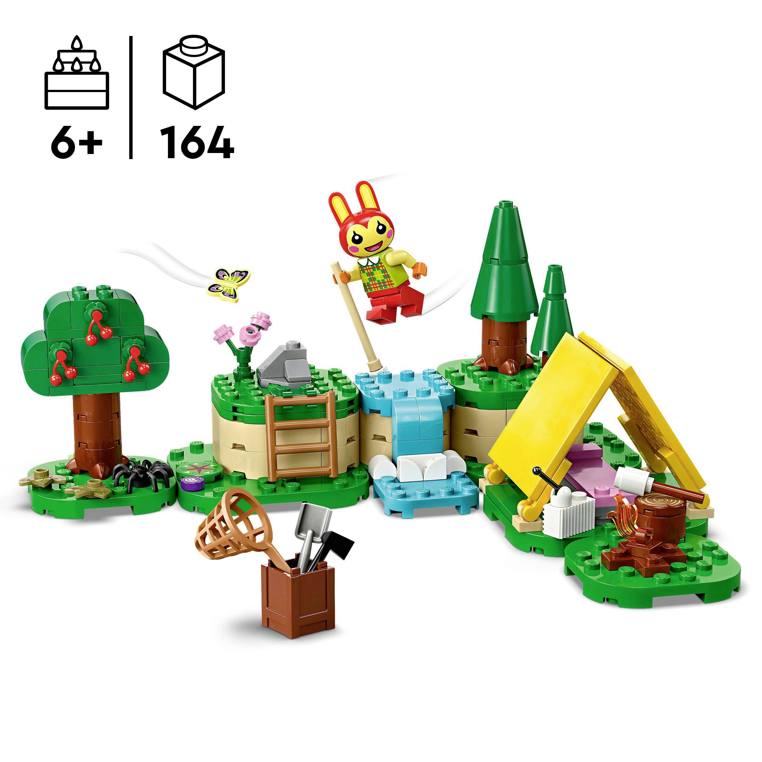 LEGO-Set mit Camping-Szene: Zelt, Bäume, Bach. Figuren: Person mit Hasenmaske, Schmetterling. Geeignet ab 6 Jahren, 164 Teile.