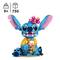 LEGO-Set einer blauen Kreatur mit großen Ohren und einer Blume auf dem Kopf, die ein Eis hält. Empfohlen ab 9 Jahren, mit 730 Teilen.