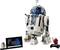 LEGO-Modell von R2-D2 mit Infotafel und zusätzlicher Mini-Figur. Das Set zeigt technische Details des bekannten Star Wars-Droiden.