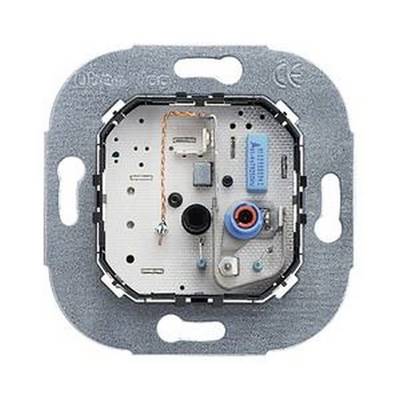 Ein elektrischer Unterputz-Bauteil mit verschiedenen Anschlüssen und einem blauen Widerstand, montiert auf einer Metallplatte.