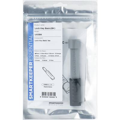 Eine Verpackung mit einem grauen 'Lock Key Basic' von Smartkeeper Essential. Produktdetails und Herstellungsland sind sichtbar.