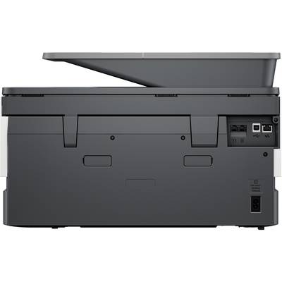 Ein Multifunktionsdrucker in seitlicher Ansicht, zeigt Ein- und Ausgabeschlitze sowie Kabelanschlüsse hinten.