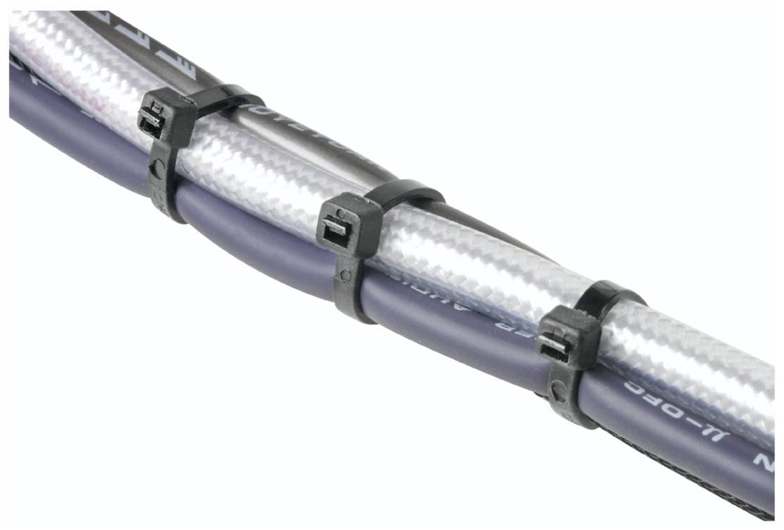 Mehrere Kabel, die mit schwarzen Kabelbindern parallel zusammengebunden sind.