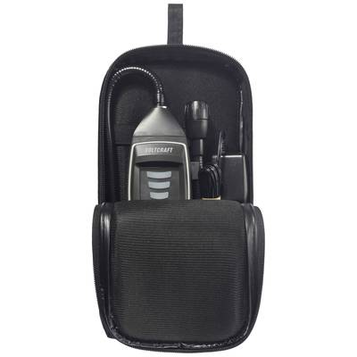 Ein schwarzes Gerät im geöffneten Etui. Das Gerät hat die Aufschrift 'Voltcraft' und wird von Kabeln und Zubehör umgeben.