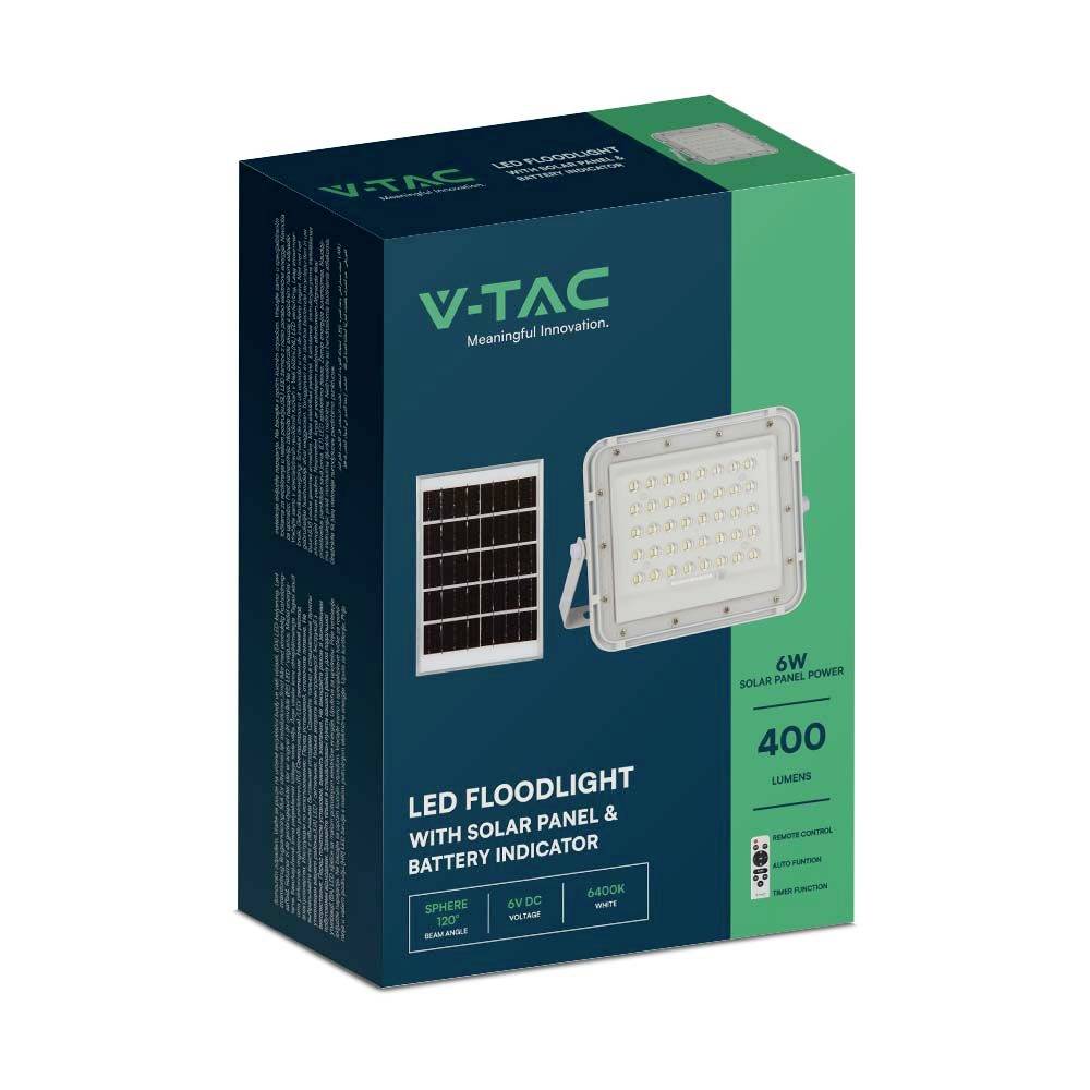 'Verpackung einer V-TAC LED-Flutlichtleuchte mit Solarpanel und Batterieanzeige, 400 Lumen, 6W Solarkapazität, grün-weißes Design.'