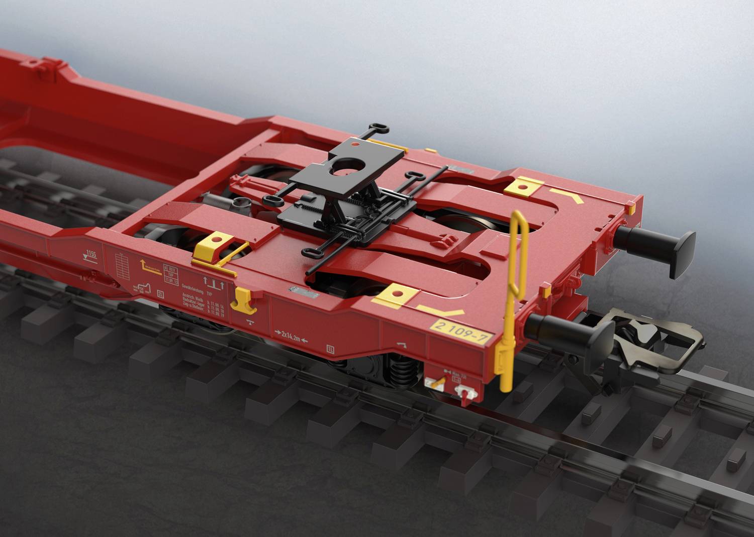 Roter Güterwagen-Kupplungsmechanismus auf Gleisen. Zeigt detaillierte technische Komponenten und Konstruktion.