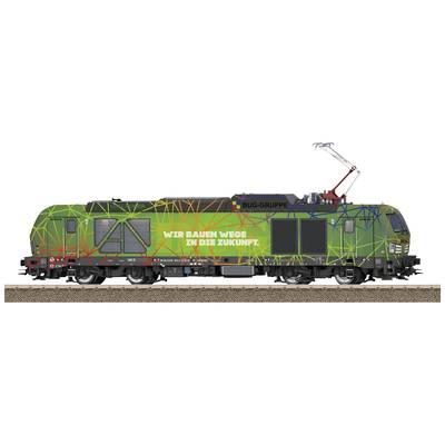 Elektrische Lokomotive mit grünem Design und bunten Linien. Aufschrift: 'Wir bauen Wege in die Zukunft.'