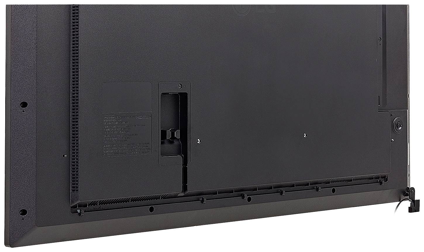 Rückseite eines Fernsehgeräts mit Anschlüssen und Lüftungsschlitzen; keine sichtbaren Marken oder Modelle.