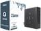 Mini-PC von Zotac, Modell ZBOX Q-Serie, neben Originalverpackung. Gehäuse hat eine perforierte Oberfläche. Verpackung betont Innovation und Kreativität.