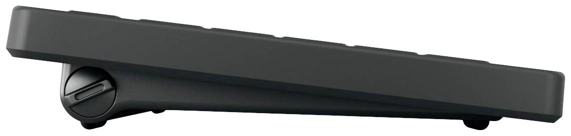 Schwarze mechanische Tastatur seitlich aufgenommen, zeigt das Profil und die Neigung der Tasten.