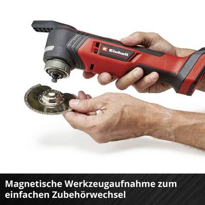Eine Hand hält einen Winkelschleifer mit abgenommenem Schleifkopf, bereit zum Zubehörwechsel. Text: 'Magnetische Werkzeugaufnahme'.